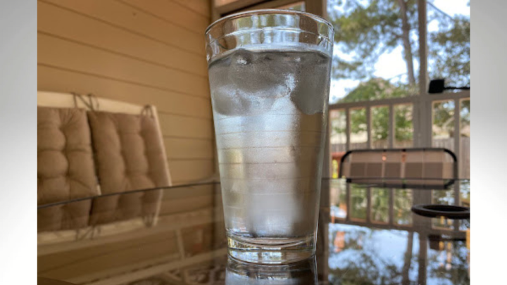 glass of Ice water on table